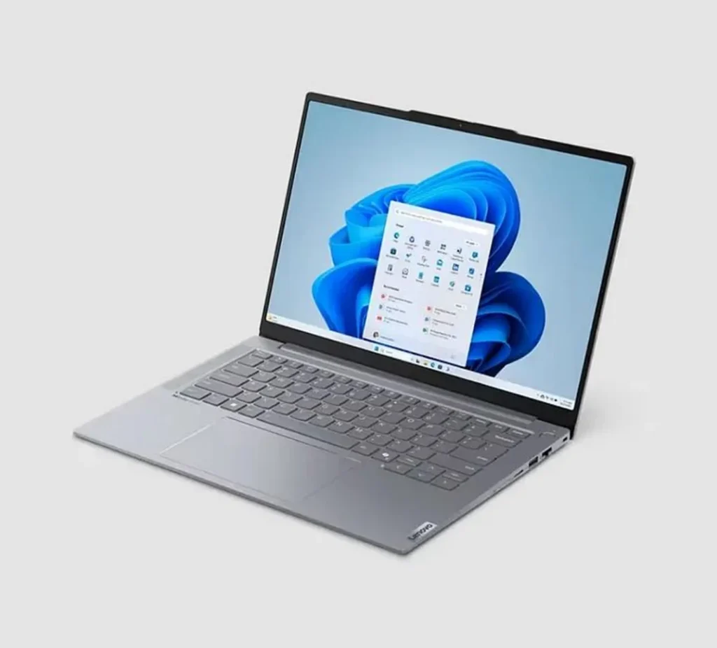Laptop displaying Windows 11 Home Start menu and modern user interface