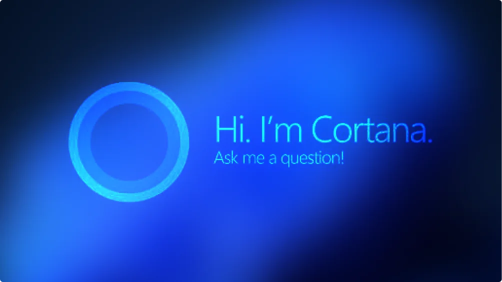 A glowing blue circular icon on a dark blue background with the text Hi, Im Cortana. Ask me a question! indicating the Microsoft digital assistant.