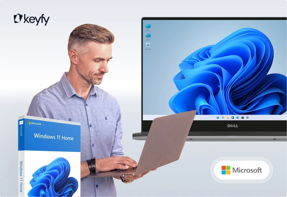 A man using a laptop stands next to a large screen displaying the Windows 11 desktop. A Windows 11 Home software box and Microsoft logo are also visible, with the Keyfy logo in the top left corner.