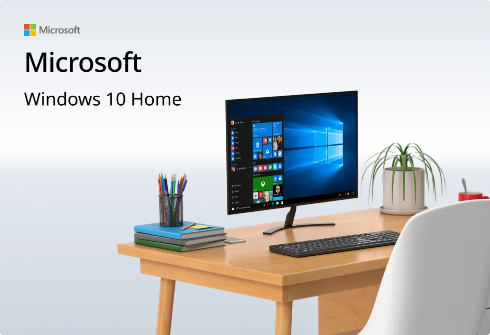 A modern desk with a computer displaying the Windows 10 Home start screen, a keyboard, mouse, stacked notebooks, pens in a holder, and a potted plant. Text reads: Microsoft Windows 10 Home.