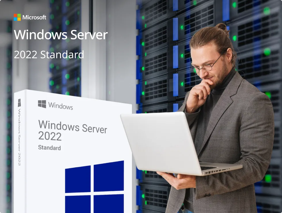 A man in a suit holds a laptop and thinks, standing next to a large Windows Server 2022 Standard software box, with a background of computer servers. Microsoft branding is visible.