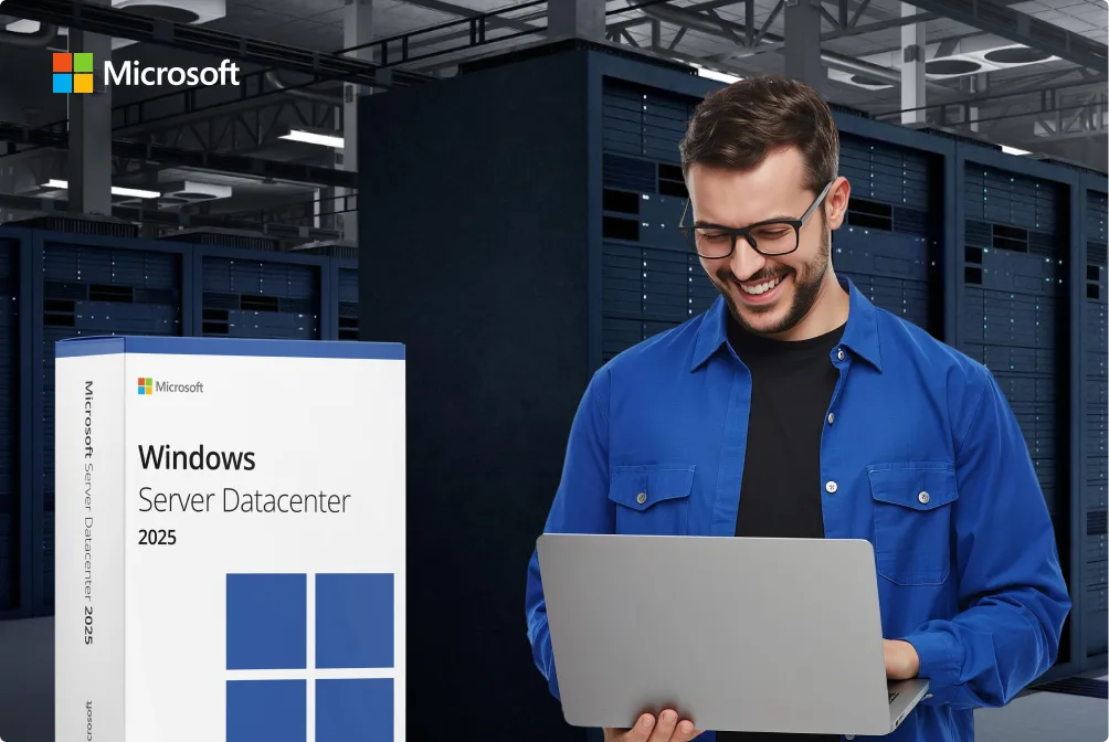 A man in a blue shirt smiles while using a laptop in a server room. Next to him is a large Windows Server Datacenter 2025 software box. The Microsoft logo is visible in the top left corner.