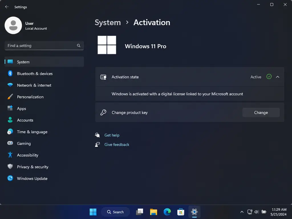Windows 11 Pro Activation screen showing the system is activated with a digital license. The left menu lists settings like Bluetooth, Network, and Updates. The activation status is highlighted as Active, showcasing one of the streamlined interface improvements often discussed in Windows 10 vs Windows 11 comparisons.
